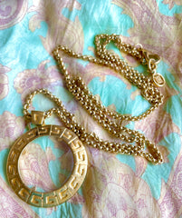 Vintage Givenchy golden chain necklace with round loupe top. Must have statement necklace. 0409274
