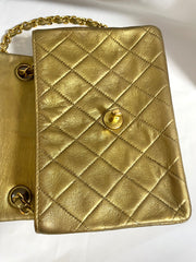 Vintage CHANEL golden lambskin flap chain shoulder bag, classic 2.55 mini purse with gold tone CC closure. 0409052