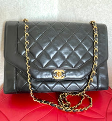 Vintage Chanel black lambskin chain 2.55 shoulder bag with gold chain. Unique hexagon shaped flap. 0407012