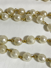 Vintage CHANEL faux pearl necklace, extra long necklace with golden round logo motif. Must have classic jewelry piece. 0408152