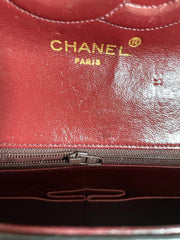 80's vintage Chanel black 2.55 shoulder bag with circle CC flap design. Rare piece from the era. 0410283