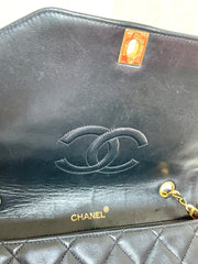 Vintage Chanel black lambskin chain 2.55 shoulder bag with gold chain. Unique hexagon shaped flap. 0407012