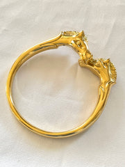 Vintage Hermes golden double horse head design bangle, bracelet. Beautiful classic jewelry from Hermes. 050120an8