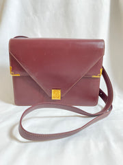 Vintage Cartier double flap envelope shoulder bag with gold-tone logo charm closure and frames. Classic purse from Must de Cartier. 0408172