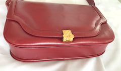 Vintage Lanvin wine leather shoulder bag with golden logo motif closure. Classic must have purse. 060620r2