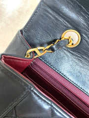 Vintage Chanel black lambskin chain 2.55 shoulder bag with gold chain. Unique hexagon shaped flap. 0407012