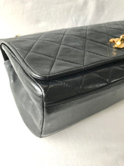 Vintage Chanel black leather 2.55 chain large shoulder bag with white trimming edge and a matching pouch. 0403284