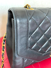 Vintage Chanel black lambskin chain 2.55 shoulder bag with gold chain. Unique hexagon shaped flap. 0407012