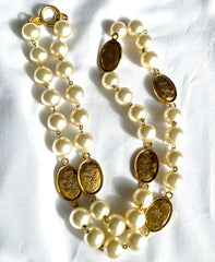 Vintage CHANEL classic faux pearl necklace with oval CC coin charms. 041205bs7