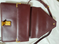 Vintage Cartier double flap envelope shoulder bag with gold-tone logo charm closure and frames. Classic purse from Must de Cartier. 0408172