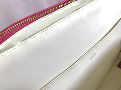 Vintage CHANEL pink canvas business bag style handbag with golden chain handle and a logo charm. Rare and collectible piece.