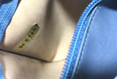 Vintage CHANEL blue quilted canvas and leather combo hobo bucket shoulder bag with drawstrings and golden CC mark balls. 060905r3