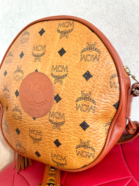 Vintage MCM brown Suzy Wong round shoulder bag with fringes. Michael  Cromer. at 1stDibs
