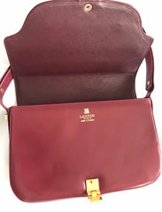 Vintage Lanvin wine leather shoulder bag with golden logo motif closure. Classic must have purse. 060620r2