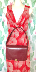 Vintage Lanvin wine leather shoulder bag with golden logo motif closure. Classic must have purse. 060620r2