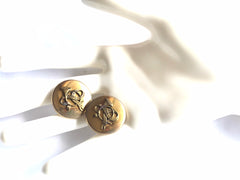 Vintage HERMES gold tone round earrings with trumpet and ribbon design. jewelry piece back in the old era. Classic Sellier series. 210805