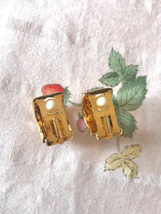 Vintage Hermes cloisonne golden earrings with red and yellow chain, medal charm, H logo jewelry print design. Great gift idea.