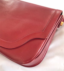 Vintage Lanvin wine leather shoulder bag with golden logo motif closure. Classic must have purse. 060620r2