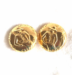 Vintage CHANEL gold tone round earrings with mademoiselle figure. Classic vintage Chanel jewelry. 0406011