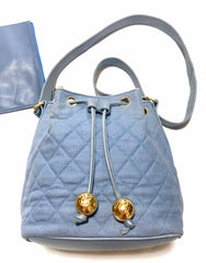 Vintage CHANEL blue quilted canvas and leather combo hobo bucket shoulder bag with drawstrings and golden CC mark balls. 060905r3