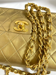 Vintage CHANEL golden lambskin flap chain shoulder bag, classic 2.55 mini purse with gold tone CC closure. 0409052