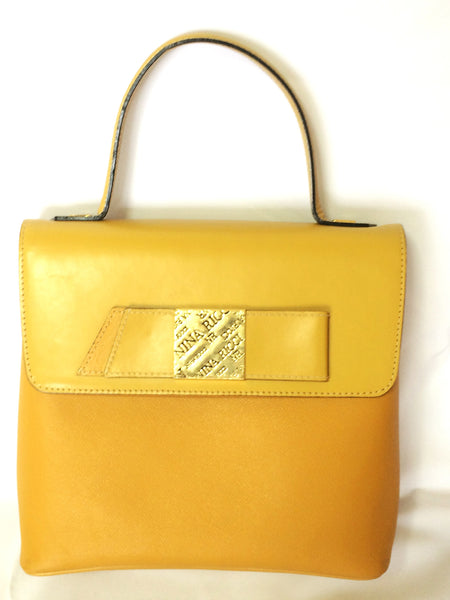 MINT. Vintage Nina Ricci yellow leather handbag purse with