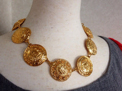 Vintage CHANEL rare statement necklace with logo embossed unique coin motif charms. Gorgeous masterpiece jewelry back in the old era.