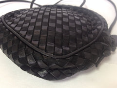 Vintage Valentino Garavani black intrecciato mini pouch style shoulder bag with V logo embossed pull. Classic purse.