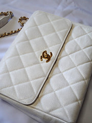 Vintage Chanel classic white caviar leather 2.55 square shape chain shoulder bag with golden CC closure. Must have purse.