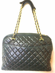 Vintage CHANEL black lambskin large classic bag with double golden chain strap and a CC pull charm. Perfect daily bag