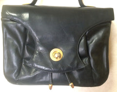 Vintage Bally black leather retro pop design bag, business purse with gold tone drawstrings and unique flap cut design. Unisex use. 160315