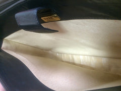 Vintage Bally black leather retro pop design bag, business purse with gold tone drawstrings and unique flap cut design. Unisex use. 160315