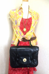 Vintage Bally black leather retro pop design bag, business purse with gold tone drawstrings and unique flap cut design. Unisex use. 160315