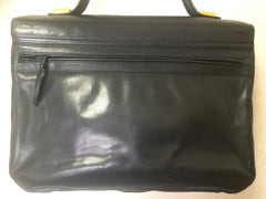 Vintage Bally black leather retro pop design bag, business purse with gold tone drawstrings and unique flap cut design. Unisex use. 160315