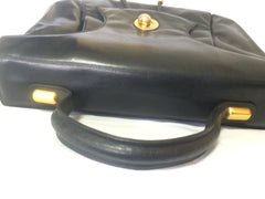 Vintage Bally black leather retro pop design bag, business purse with gold tone drawstrings and unique flap cut design. Unisex use. 160315