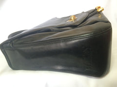 Vintage Bally black leather retro pop design bag, business purse with gold tone drawstrings and unique flap cut design. Unisex use. 160315