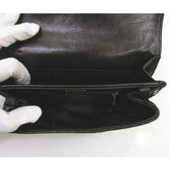 Vintage Bally black woven intrecciato design leather clutch purse, pouch with golden B logo motif and tassel at front.