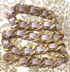 80's Vintage CHANEL beige leather thick chain belt with golden CC and mademoiselle charm. Nice and heavy single layer belt from CHANEL.