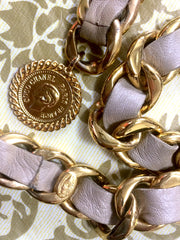 80's Vintage CHANEL beige leather thick chain belt with golden CC and mademoiselle charm. Nice and heavy single layer belt from CHANEL.