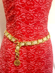 80's Vintage CHANEL beige leather thick chain belt with golden CC and mademoiselle charm. Nice and heavy single layer belt from CHANEL.