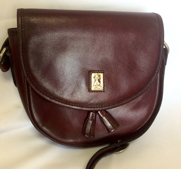 La Prima Mini Leather Crossbody Bag