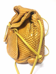 Vintage Carlos Falchi genuine yellow snakeskin shoulder bag in unique round form. Can be pouch too.
