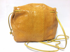 Vintage Carlos Falchi genuine yellow snakeskin shoulder bag in unique round form. Can be pouch too.