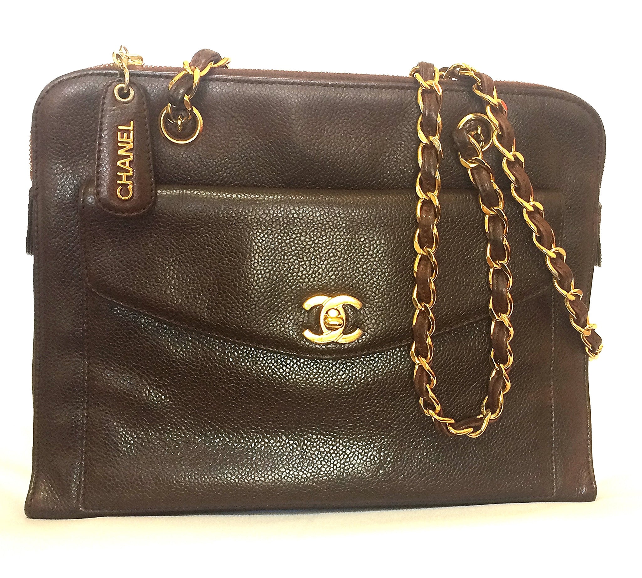 Vintage CHANEL dark brown caviarskin chain shoulder tote bag with golden CC closure. Classic and daily use bag