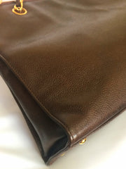 Vintage CHANEL dark brown caviarskin chain shoulder tote bag with golden CC closure. Classic and daily use bag