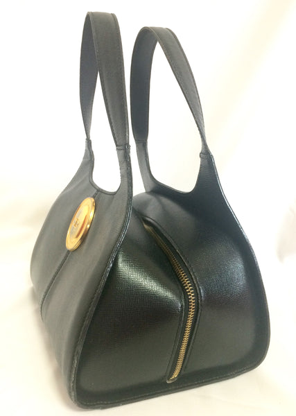 Vintage Christian Dior grained black leather handbag with oval