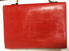 Vintage FENDI genuine red leather classic handbag with iconic Janus medallion embossed motif at front. 050628ya1