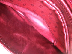 80's vintage FENDI red oval round shape shoulder purse with small FF logo print allover. So chic and cute.
