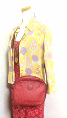 80's vintage FENDI red oval round shape shoulder purse with small FF logo print allover. So chic and cute.
