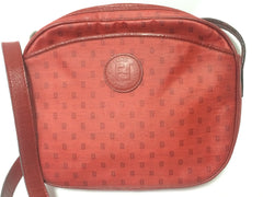 80's vintage FENDI red oval round shape shoulder purse with small FF logo print allover. So chic and cute.
